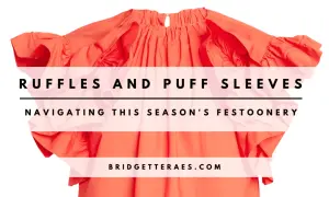 A bright orange top with voluminous ruffles and puff sleeves, overlaid with text.