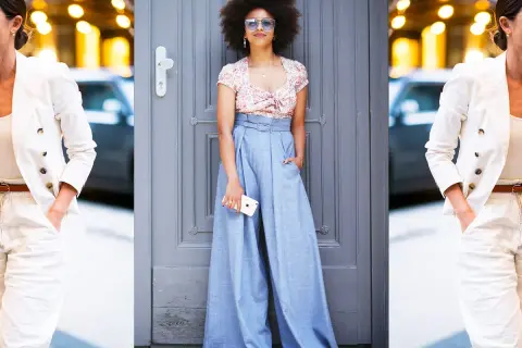 Donna con afro e occhiali da sole indossa un crop top floreale e un **pantalaccio** azzurro a vita alta.