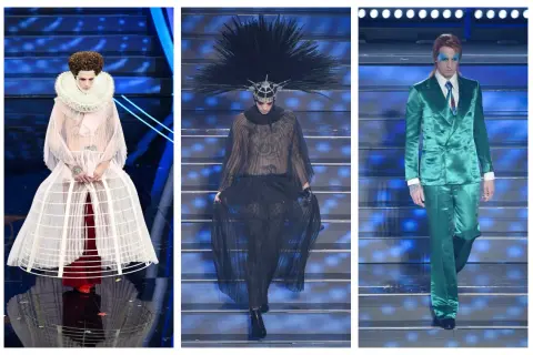 Tre look audaci sul palco di Sanremo: un abito rosa con crinolina, un completo nero trasparente con piume e un completo verde smeraldo.