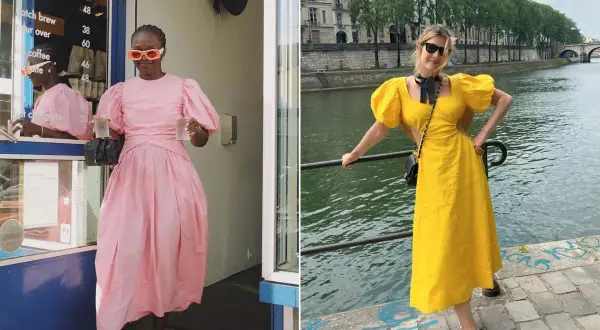 Donna con abito rosa con maniche a sbuffo, e un'altra donna con abito giallo con maniche a sbuffo, a Parigi.