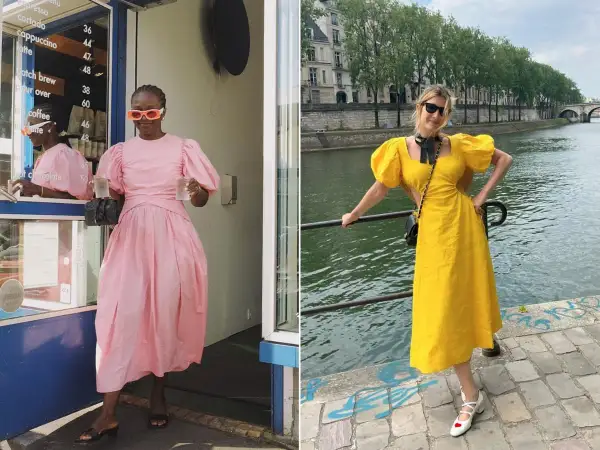 Donna con abito rosa con maniche a sbuffo, e un'altra donna con abito giallo con maniche a sbuffo, a Parigi.